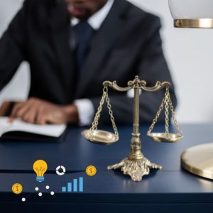 Lawyer sitting at a desk with scales on them with a corner graphic with idea and scaling graph.